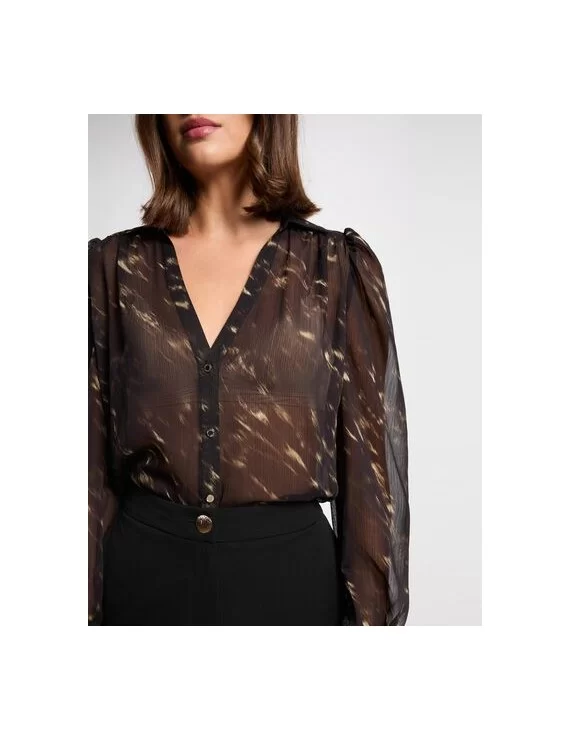 CAMISA COM TRANSPARÊNCIA FLUIDA
