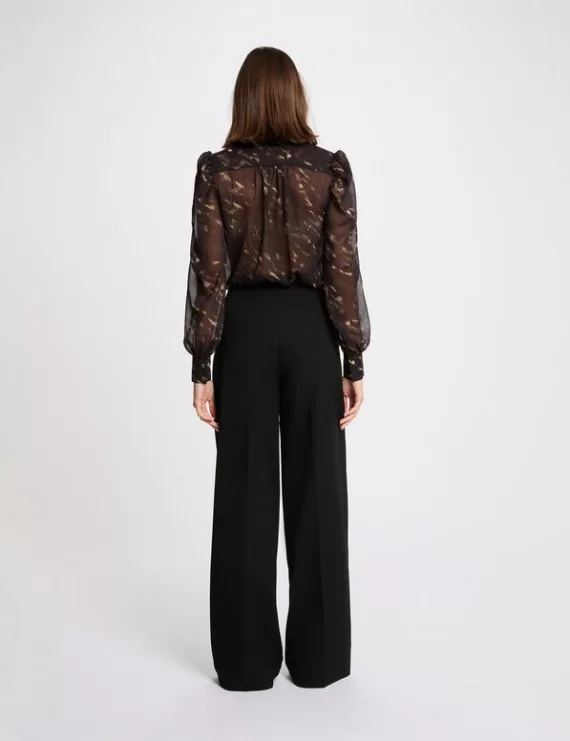 CAMISA COM TRANSPARÊNCIA FLUIDA